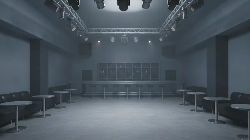 An empty generic nightclub interior with a standard lighting rig, dim and characterless